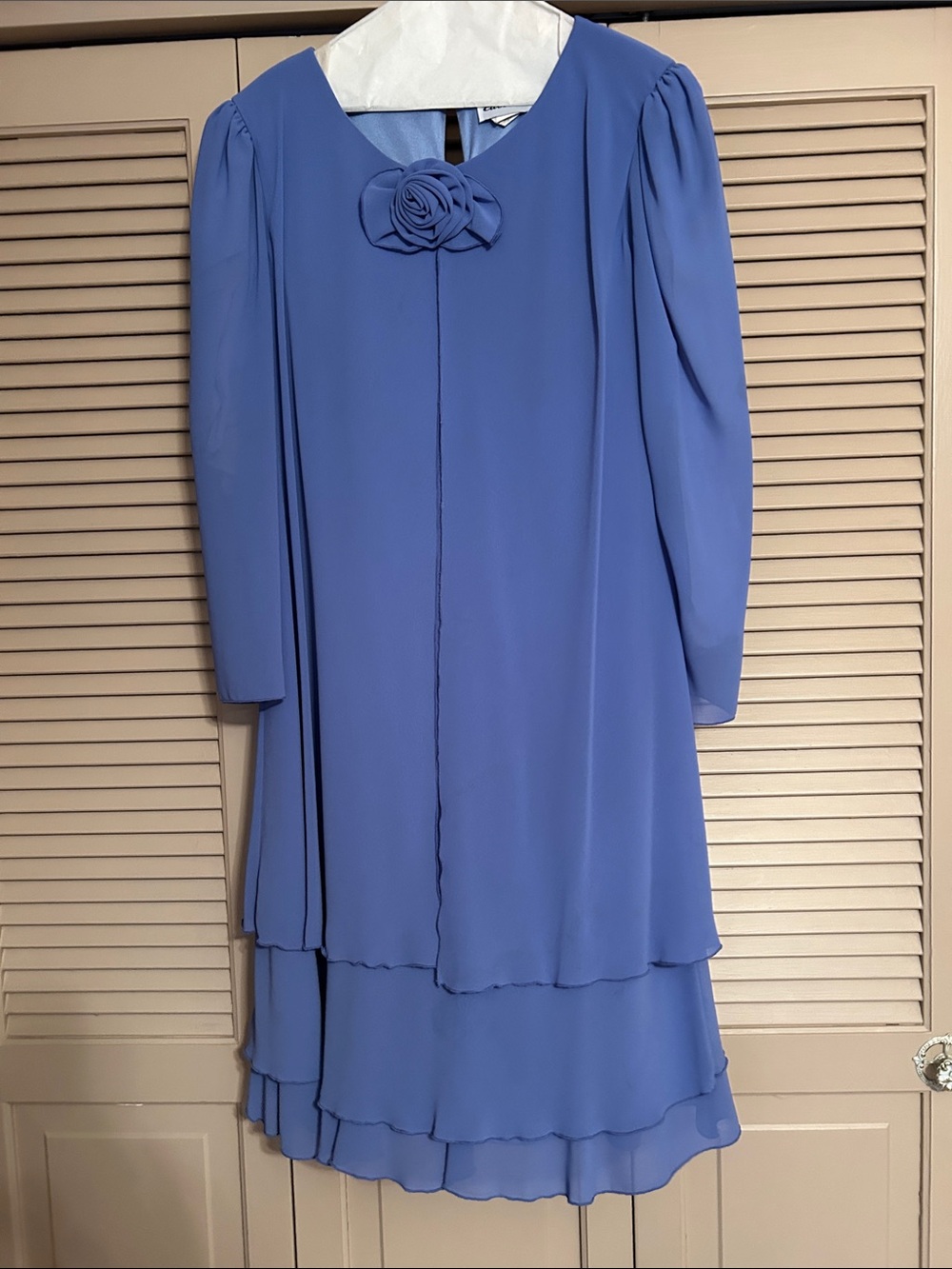Elegant Blue Layered Chiffon Dress with Floral Accent